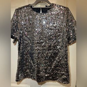 Express silver sequence top in a size medium